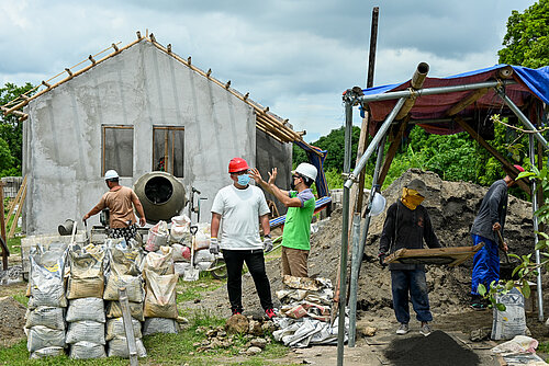 Photo: Hilti: Men building bamboo house