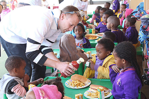 Photo: Hilti: Man helping Children in Jerusalem Children’s Home