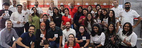 Photo: Hilti: A group of people holding a piece of paper