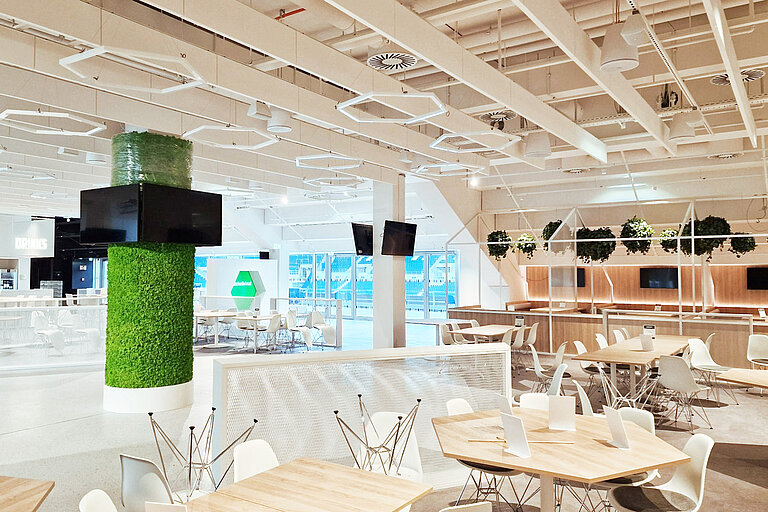 Photo: Hilti: The cafeteria area of the stadium with tables and chairs to sit