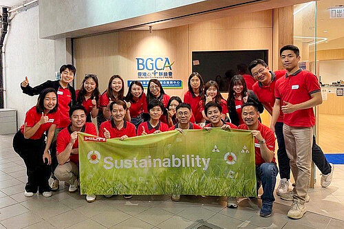 Hilti: Group photo of members at The Boys’ and Girls’ Clubs Association of Hong Kong wearing red shirts.